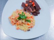 Una foto de risotto de setas al romero