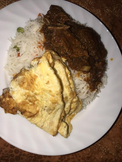 A picture of Vegetable white rice and stew with egg.