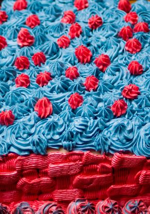 A picture of Vanilla cake with butter cream icing.