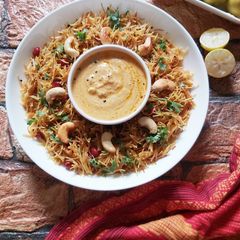 A picture of Lemon Semiya Upma with Carrot Chutney.