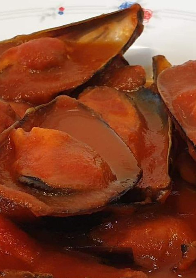 Una foto de Mejillones en salsa de tomate picante