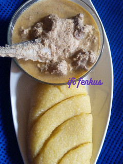 A picture of Melon pepper soup paired with Eba.