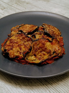 Una foto de Berenjenas a la parmesana