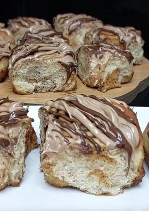 A picture of Cinnamon rolls with nutella frosting.