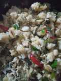 Salteado de verdura con pejerrey y arroz