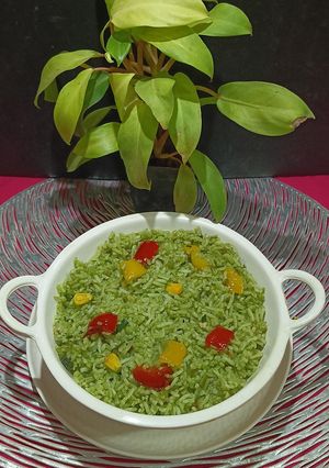 A picture of Garlic Palak Pulao From Left Over Rice.