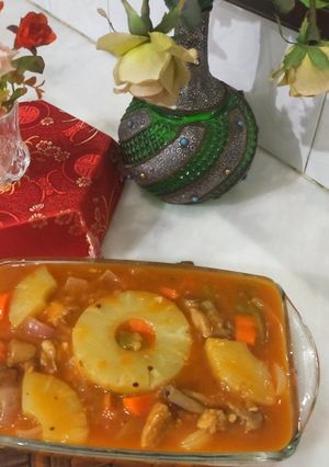 A picture of Grilled pineapple chicken with vegetables.
