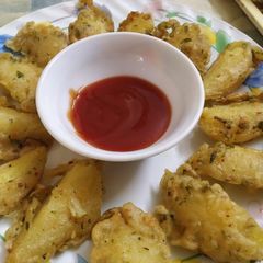 A picture of Potato Wedges.