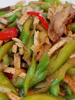 A picture of Celery chicken and braised tofu stirfry #mommasrecipes.