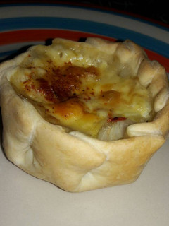 Una foto de Canastitas rápidas de queso y cebolla