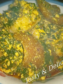 A picture of Egusi and bitterleaf soup.