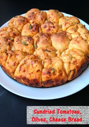 A picture of Sundried Tomatoes, Olive, Cheese Bread.