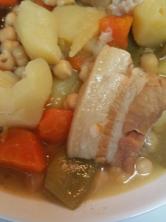Una foto de Puchero con pringa