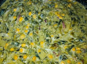 Una foto de Rajas poblanas con queso y nata