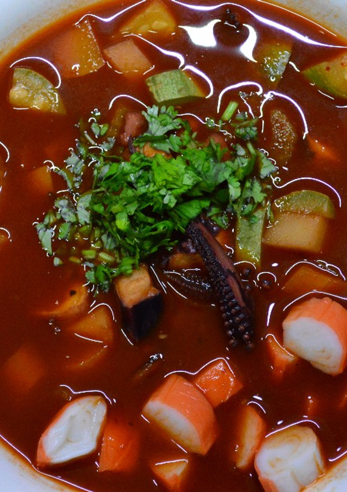 Una foto de Caldo de calamar 🦑