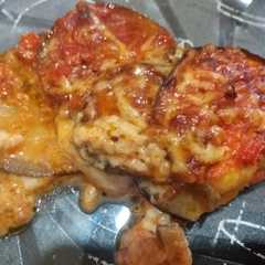A picture of Berenjena a la parmesana 🍆🍆.