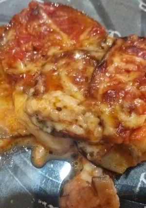 Una foto de Berenjena a la parmesana 🍆🍆