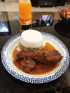 A picture of Rice, beans and stew.