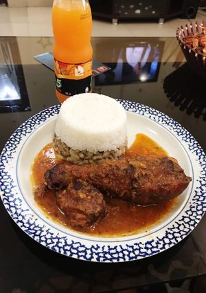 A picture of Rice, beans and stew.