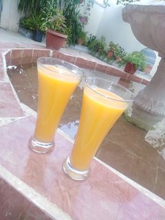 صورة لوصفة عصير برتقال وجزر 🍊
