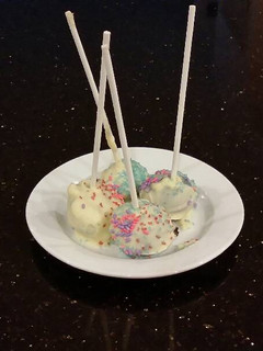 A picture of Chocolate Fudge Cake Pops With White Choclate Coating.
