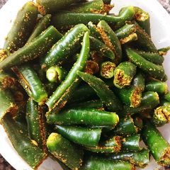A picture of Green chilli pickle.