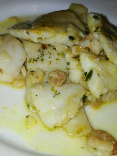 Una foto de Merluza al vino blanco