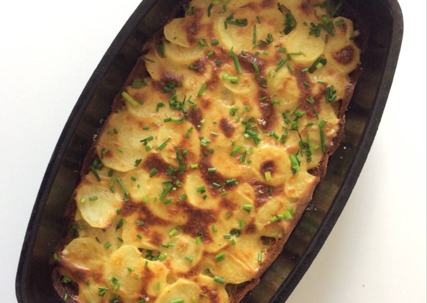 Baked potatoes with cheese and garlic