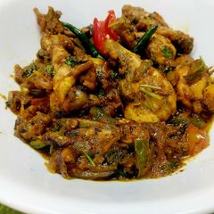 A picture of Curry Leaf Pepper Chicken.