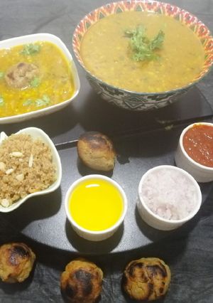 A picture of Dal baati in appe pan.