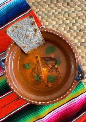 Una foto de Queso panela en salsa