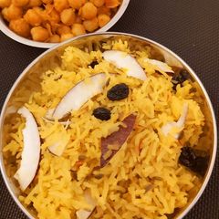 A picture of Sindhi Tahiri Sweet Rice with Jaggery.