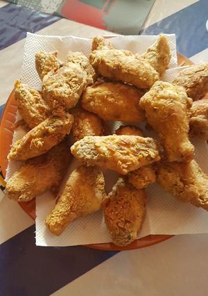 Una foto de Alitas de pollo tipo kfc