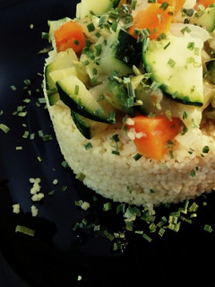 Una foto de Cuscús con verduras