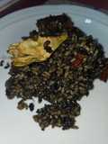 Arroz negro de conejo y verduras