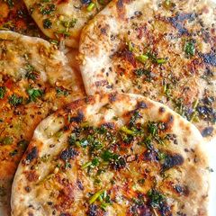 A picture of Amritsari spicy Paneer Kulcha.