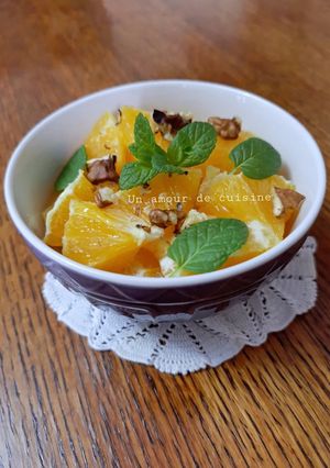 Une photo de Salade d'oranges miel noix et menthe 🍊