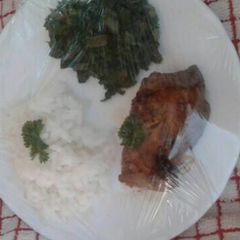 A picture of Steamed rice,grilled chicken and fried spinach.