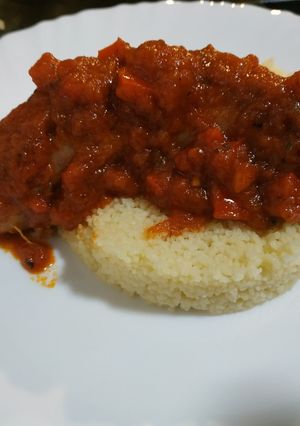 Una foto de Chorizo criollo a la pomarola con cous cous