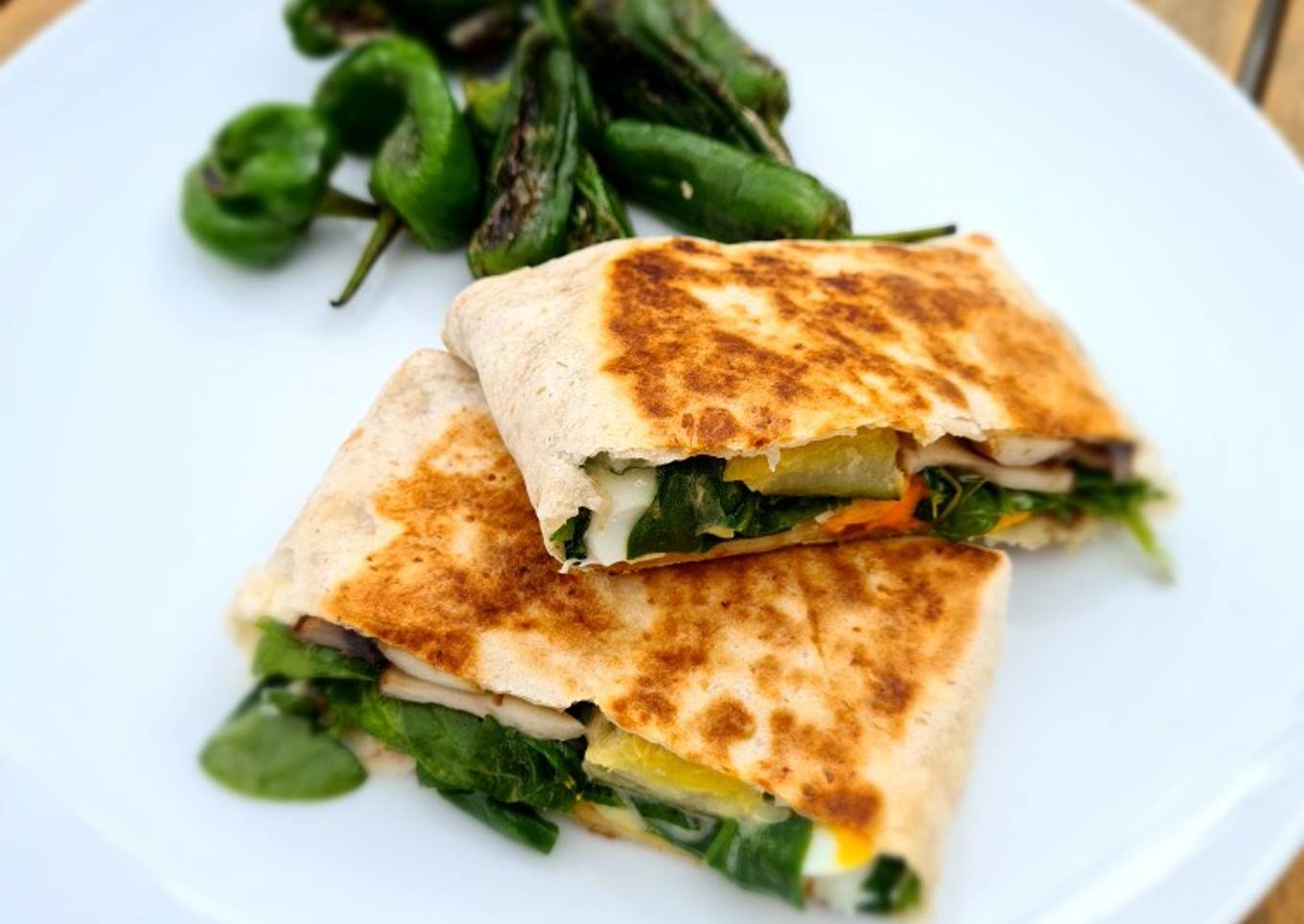 Healthy egg and veggie toasted wrap with cream cheese