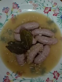 Una foto de Salchichas al vino