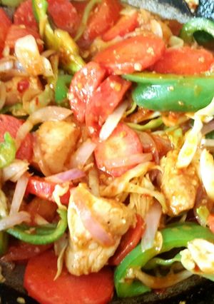 A picture of Chicken and Veggie Stir fry with rice 😋.