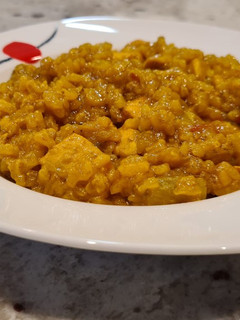 Una foto de Arroz con berenjenas y pollo