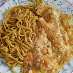 A picture of Mustard chicken in carrot and parsnip sauce.