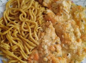 A picture of Mustard chicken in carrot and parsnip sauce.