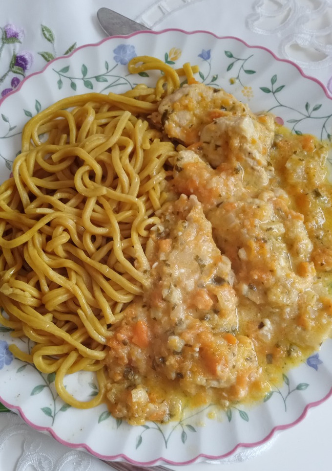 A picture of Mustard chicken in carrot and parsnip sauce.