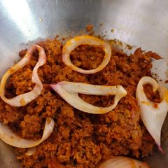 A picture of Smoked tandoori tawa qeema.