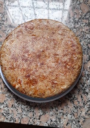 Una foto de Tortilla de papa rallada, sesos y cebolla