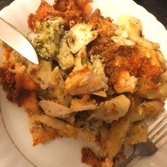 A picture of Creamy pesto salmon pasta bake.