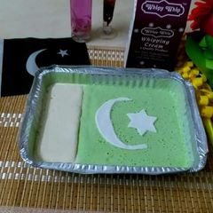 A picture of Green and white ice cream.